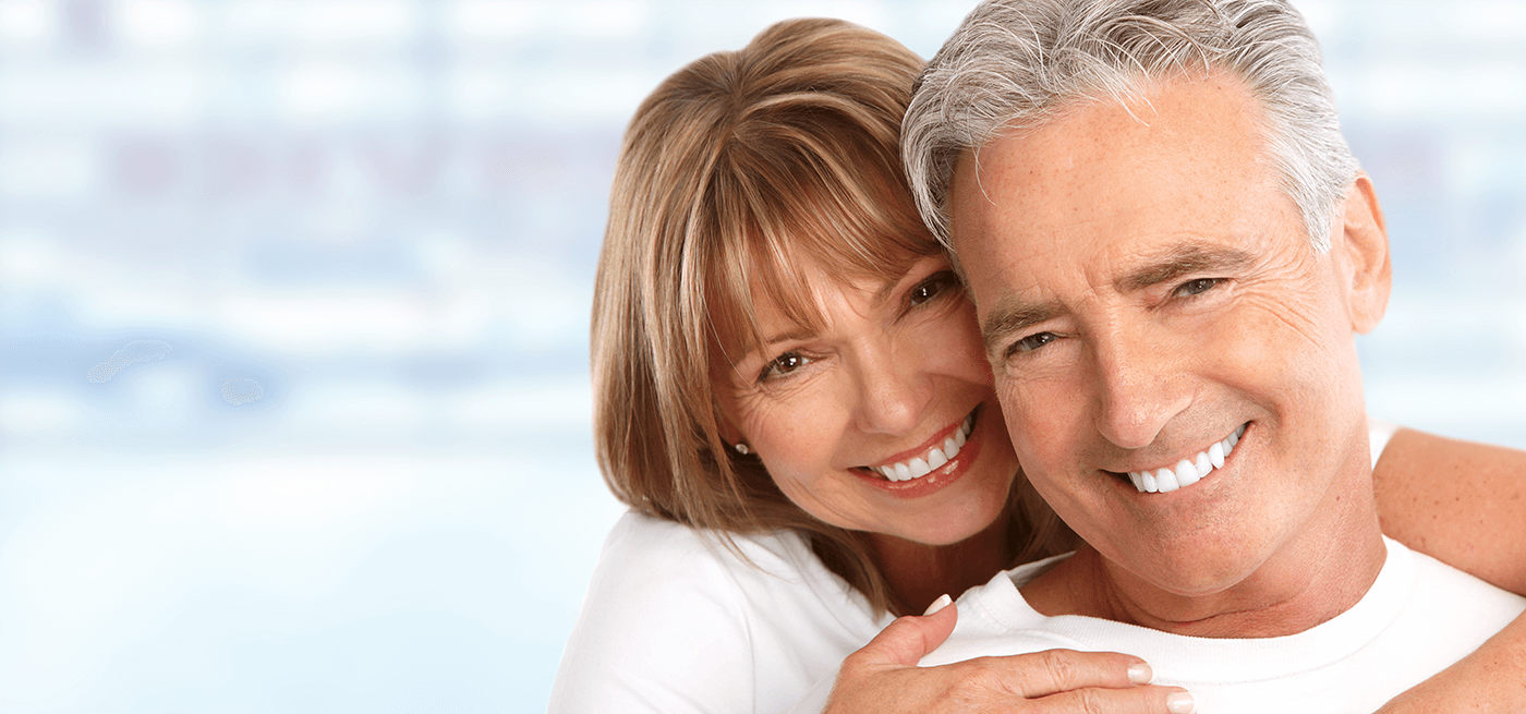 elder couple with good teeth